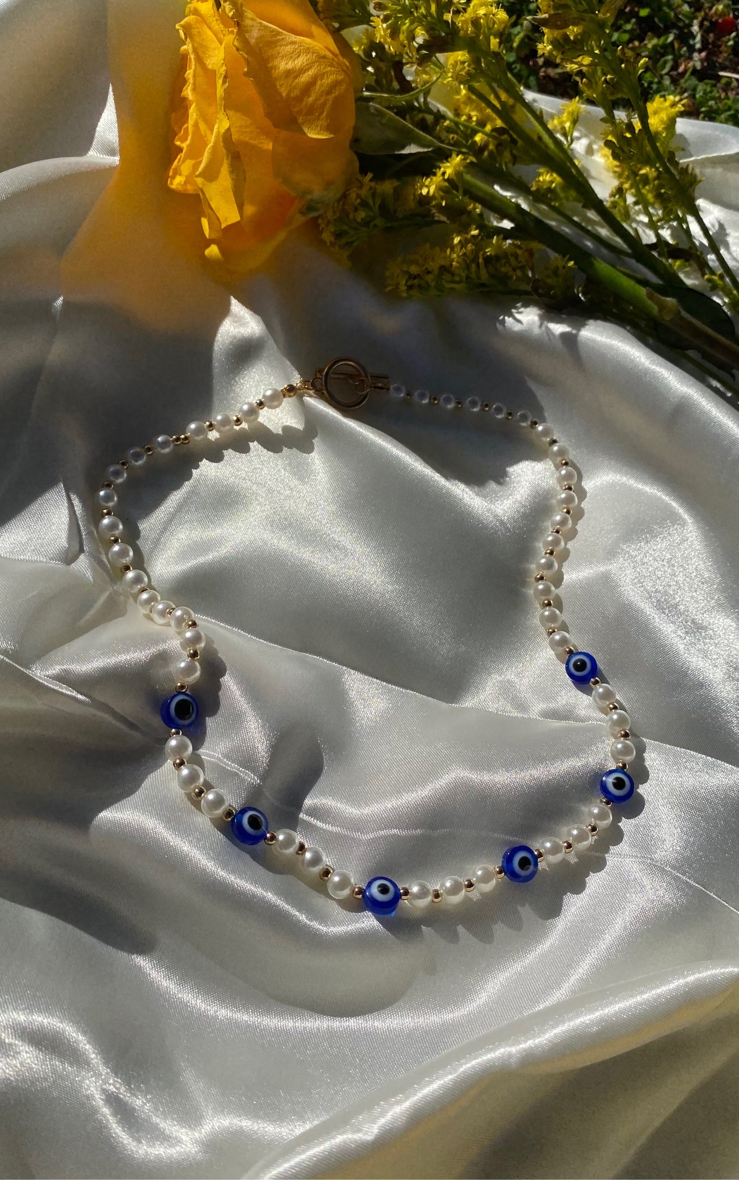 evil eye pearl necklace